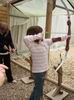 Child with aiming a bow and arrow