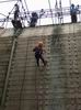 Child climbing a wall