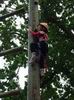 Child climbing a pole